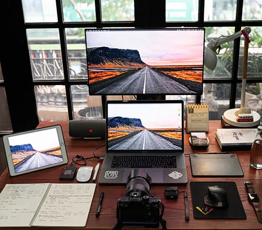 Workplace with laptop and tablet