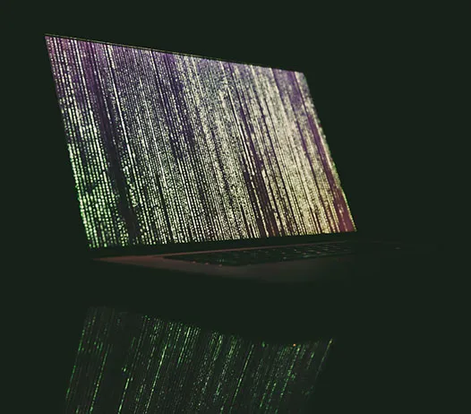 Laptop with code on the screen